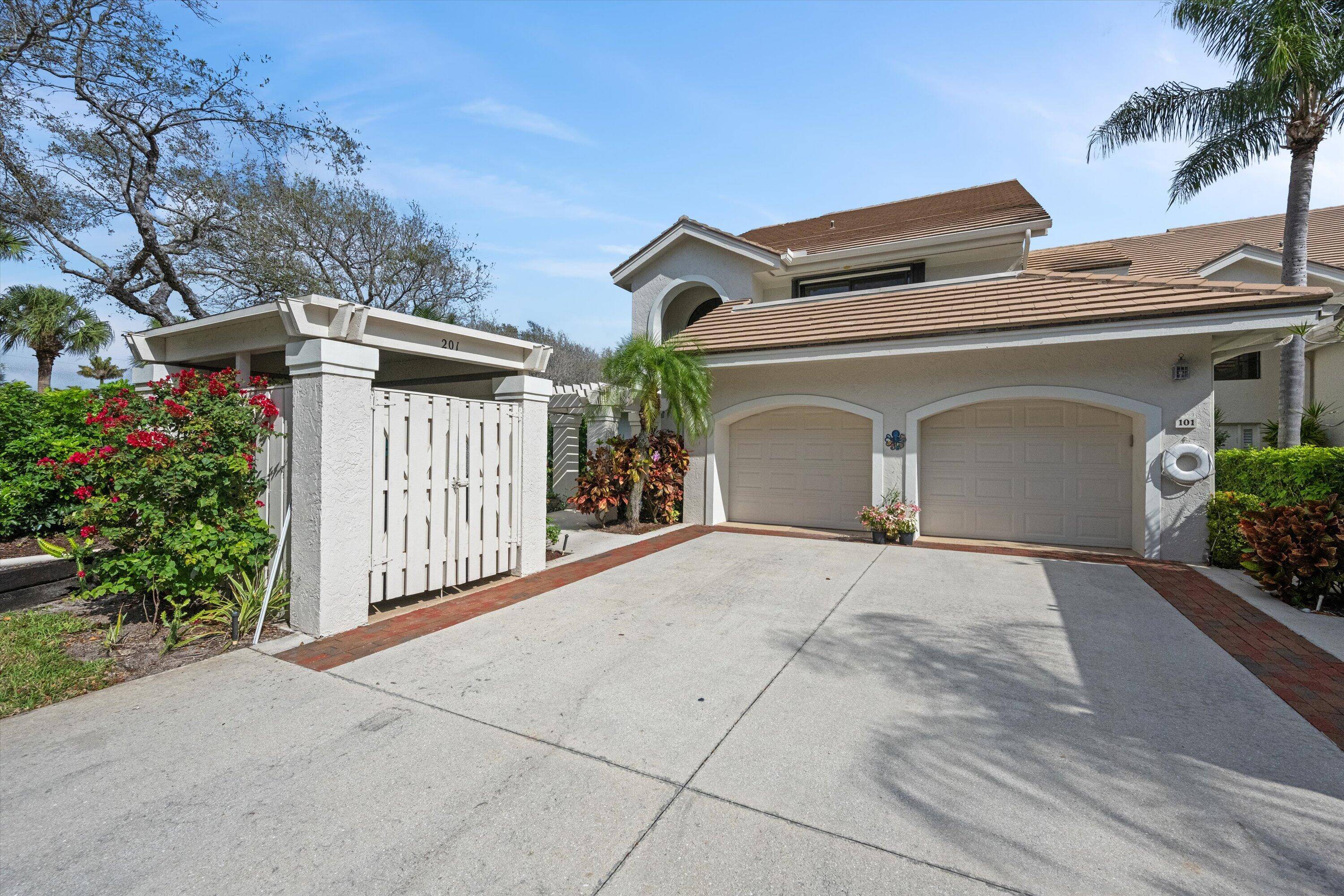 Meticulously maintained corner unit boasting PANORAMIC lake views.