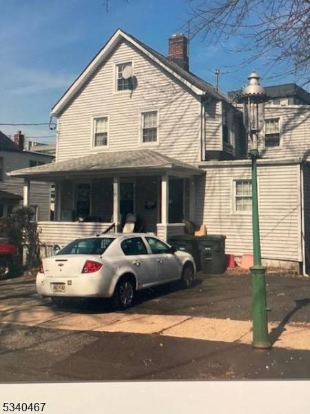 RARE OPPORTUNITY ! This property is a combination of residential 2 Family house with 2 rental units and commercial ample 15 parking spaces and a 3 bay, 2 story commercial ...