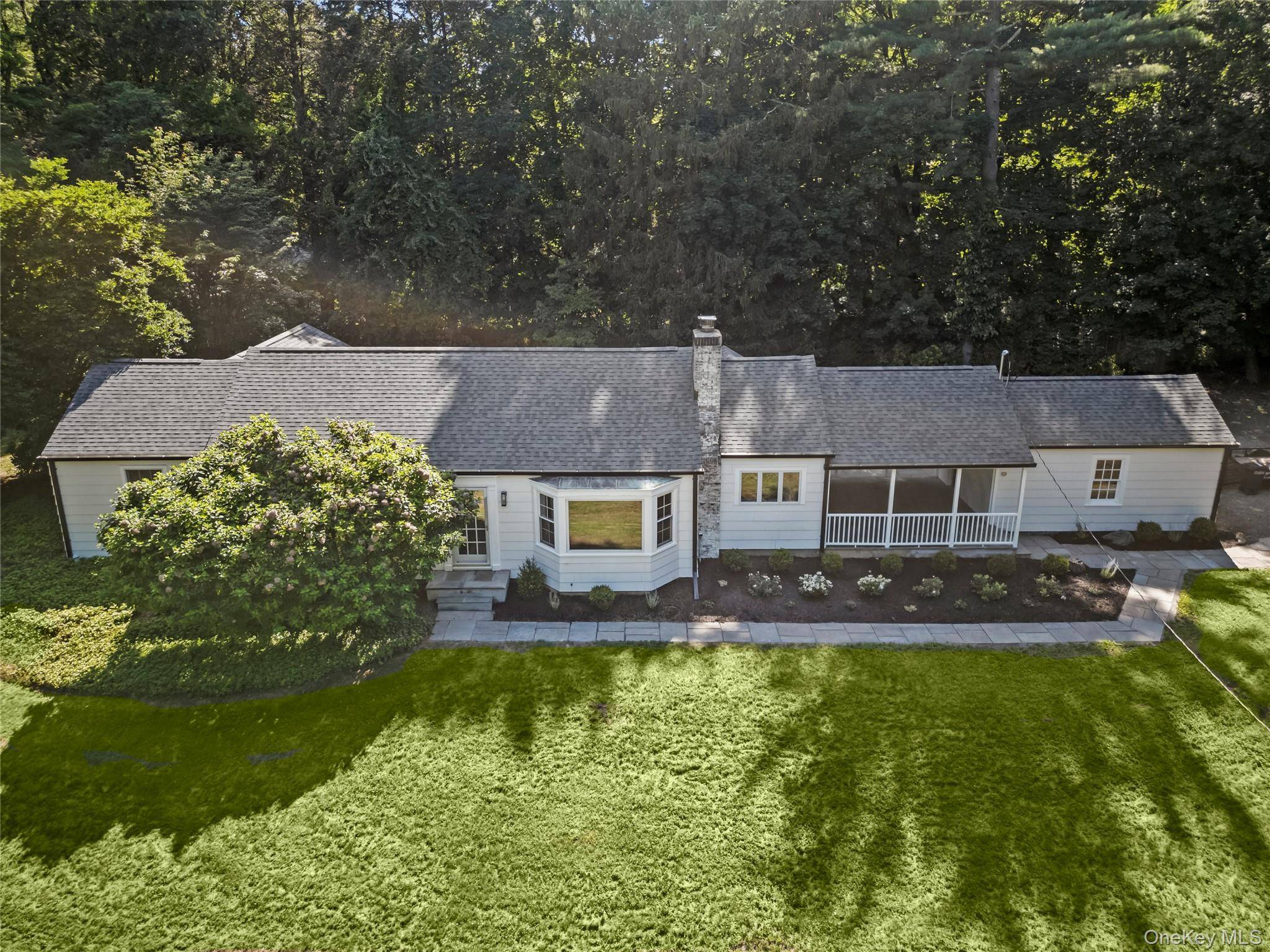 Move right into this beautifully updated three bedroom, two bathroom ranch, perfectly situated within the award winning Chappaqua school district.