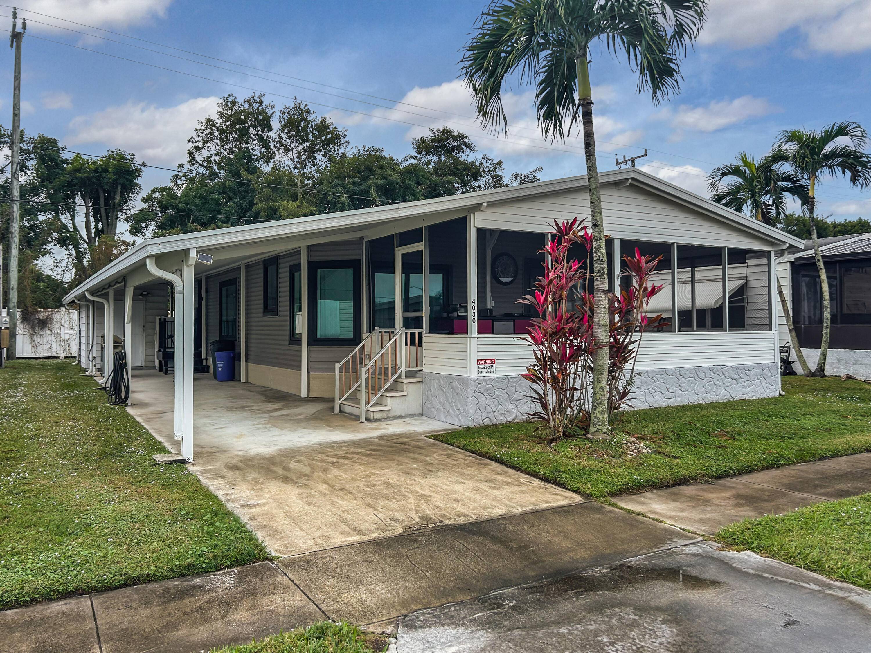 You Own the Land directly Welcome to this beautifully maintained 3 bedroom, 2 bathroom mobile home, ideally located in the heart of Boynton Beach !