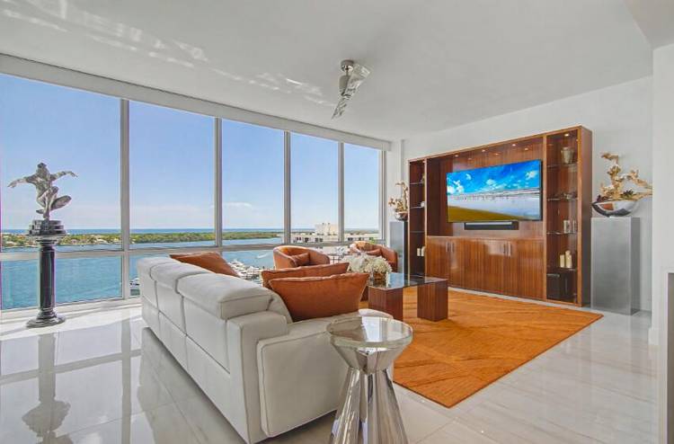 Experience elevated coastal living in this LUXURY BOUTIQUE WATERFRONT TOWER with an exceptional three bedroom residence in the heart of North Palm Beach.