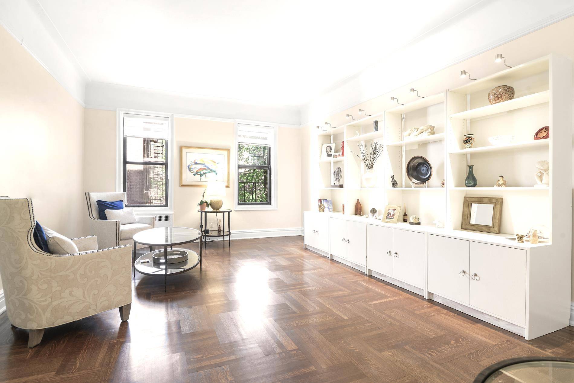 This pristine recently renovated 2 bedroom has a contemporary elegance while keeping original Prewar details.