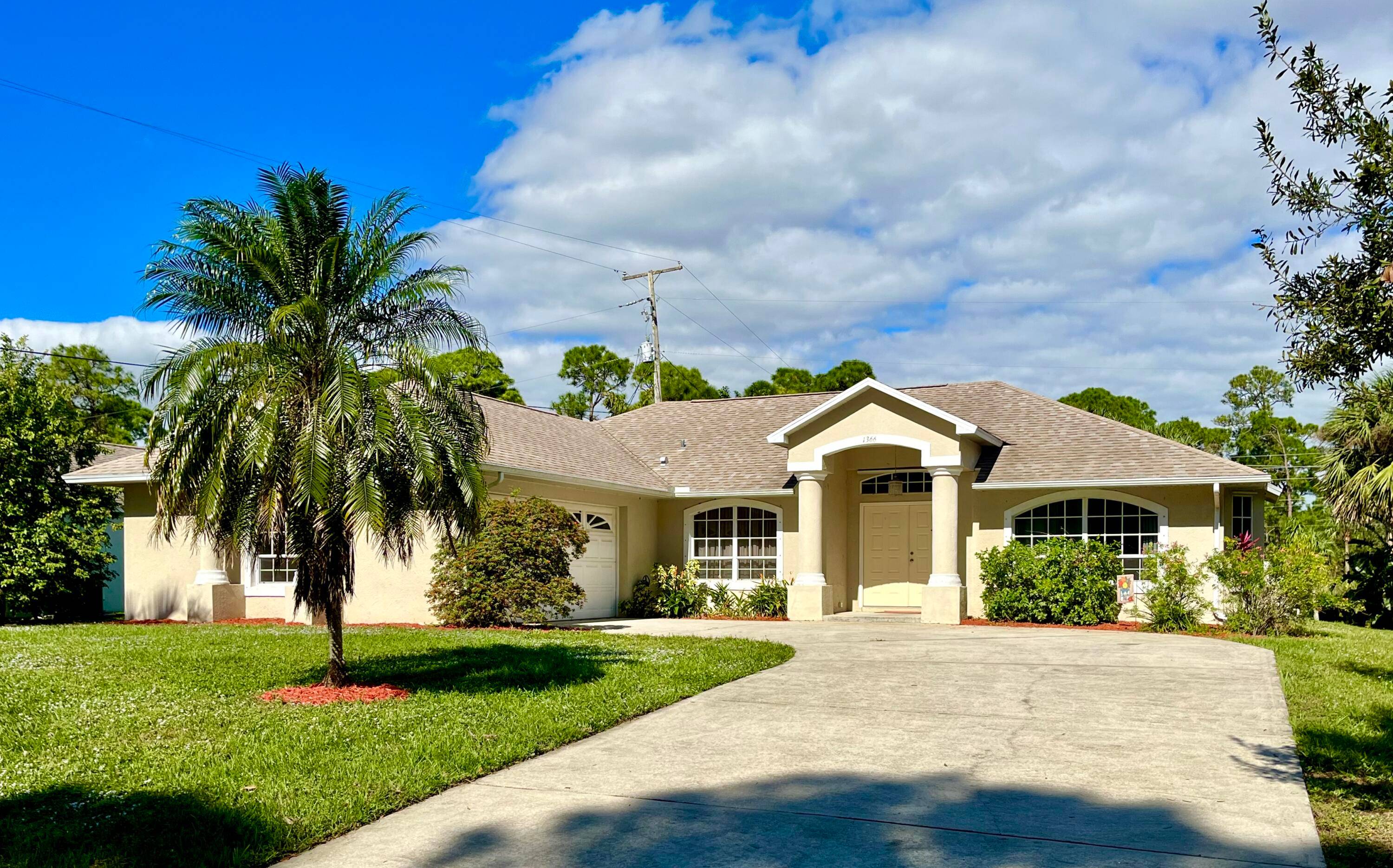 Pool home no deed restrictions paved road county water located on a quite interior lot in the Northeast section of the Vero Beach Highlands community.