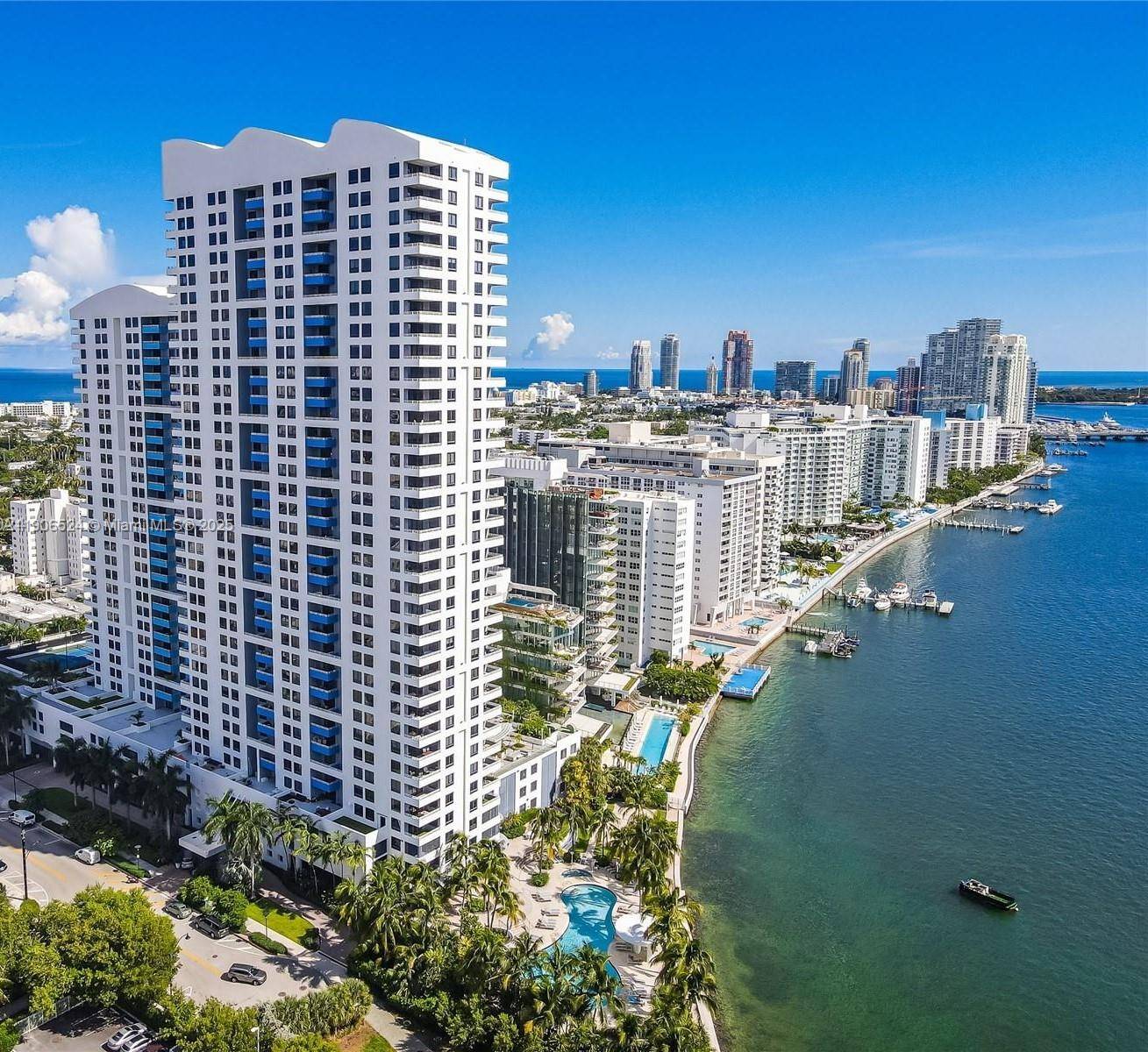 Waverly high floor, corner unit with great light and amazing views to ocean and Miami Beach skyline.