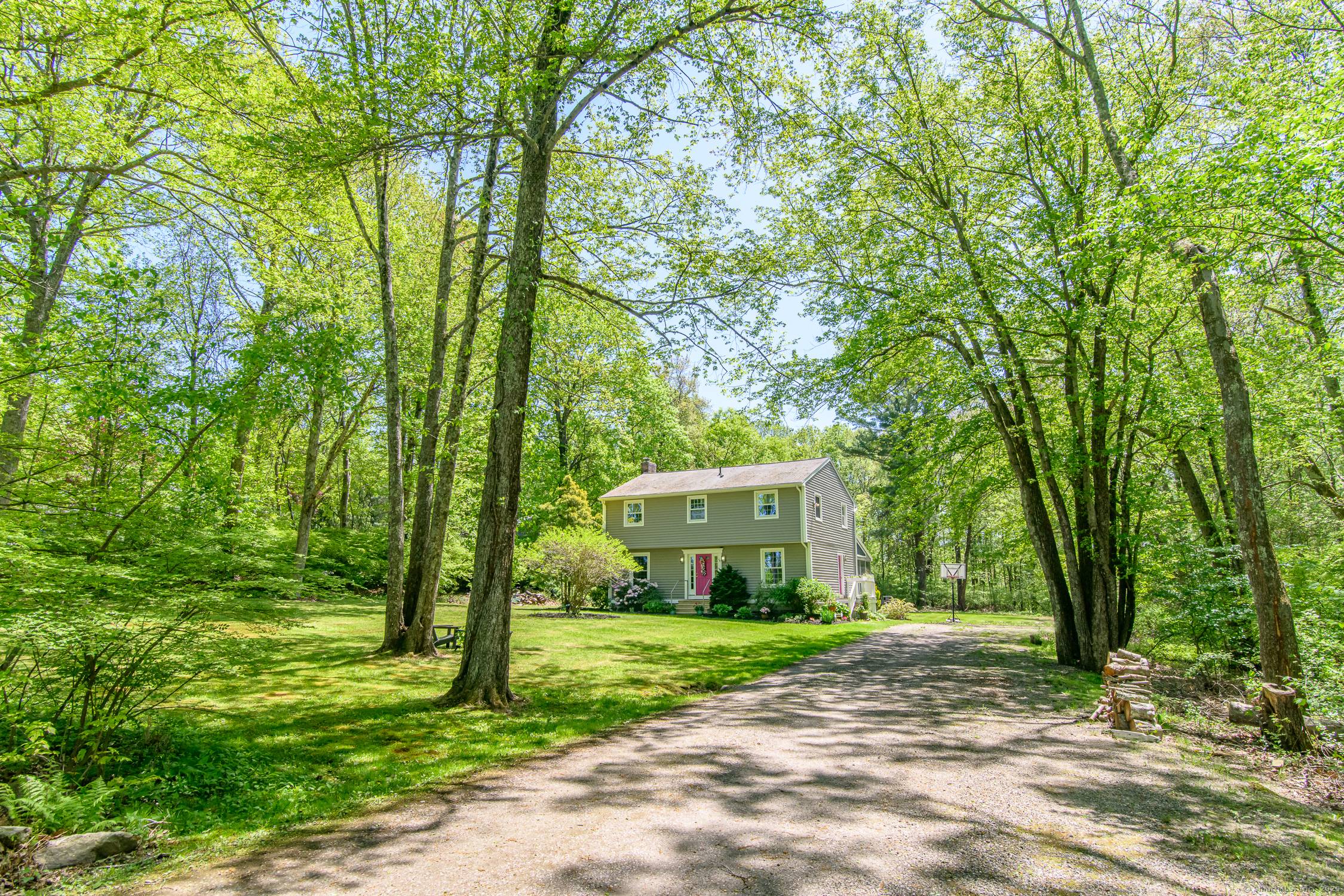 This 4 Bedroom 2. 5 bath meticulously maintained Colonial style home offers a seamless blend of classic charm and modern comfort creating an inviting and functional living environment.