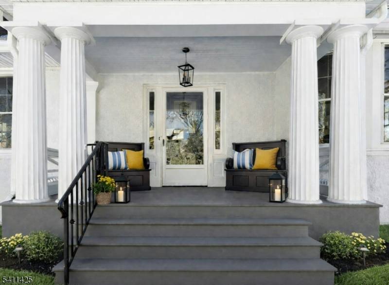 Rare opportunity to own a fully renovated turn of the century Colonial on an oversized.