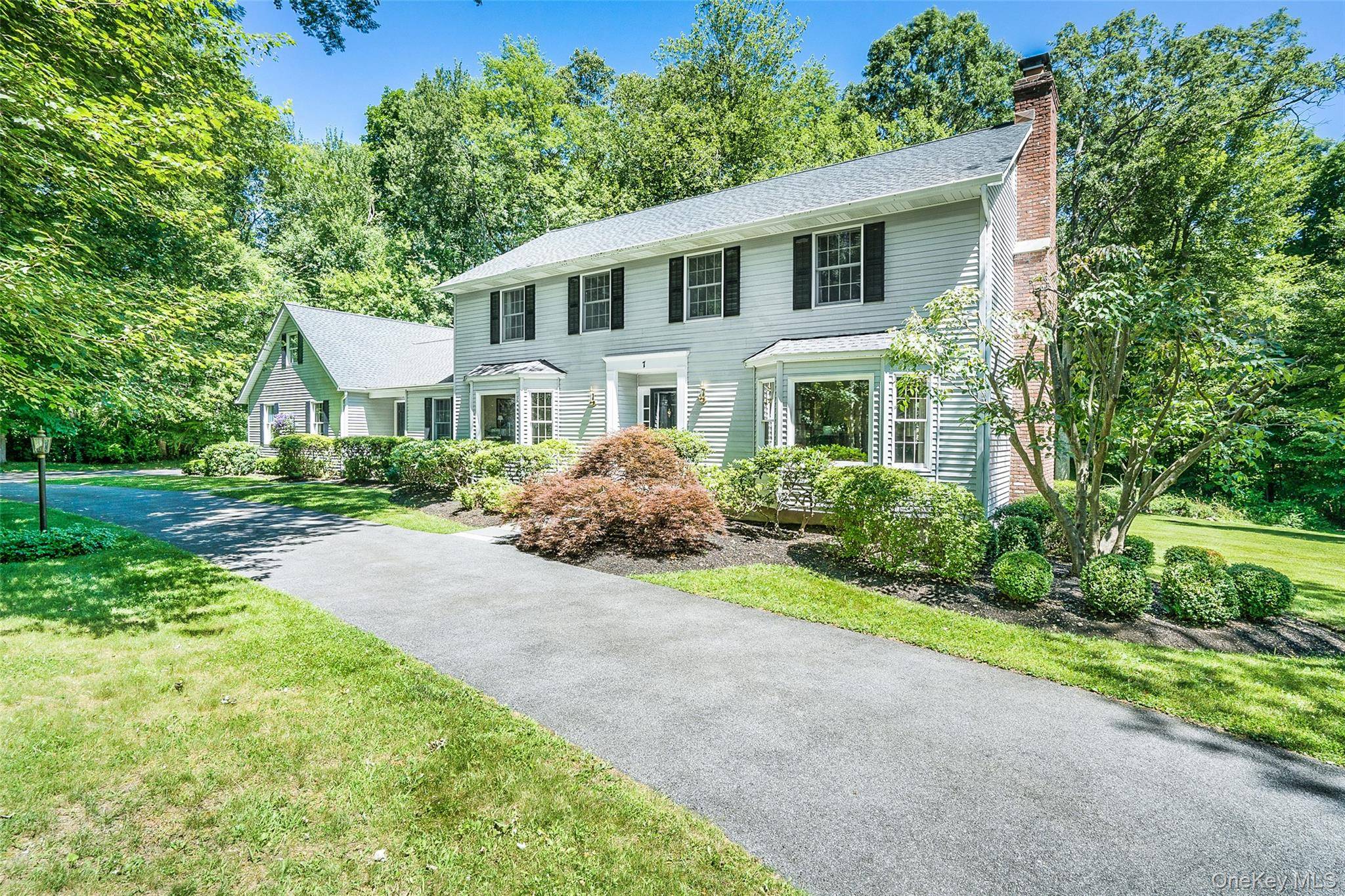 Waccabuc Nestled on two picturesque acres, this elegant 4 bedroom Colonial offers timeless charm and modern comfort in a serene, private setting minutes from local amenities.