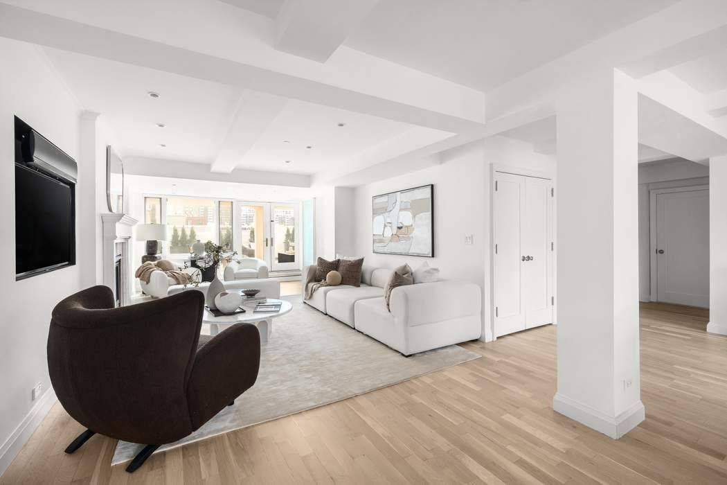 Centered around a beautifully landscaped terrace with sweeping New York City views, this recently renovated four bedroom, three bathroom Lenox Hill condominium offers exceptional scale, privacy, and a true indoor ...