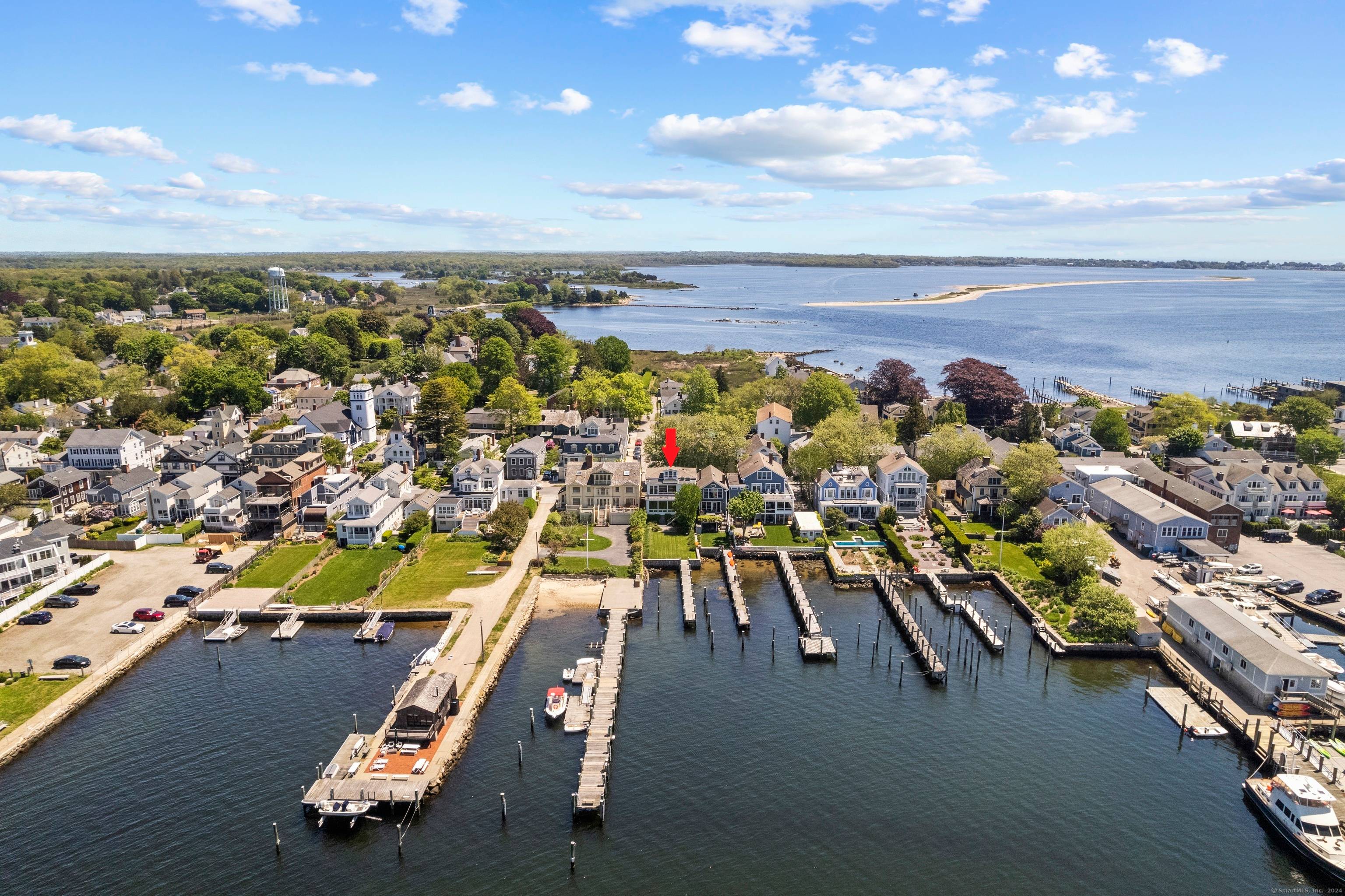 Exquisite waterfront property in the heart of the Stonington Borough with stunning unobstructed water views through the floor to ceiling windows and a private dock on Stonington Harbor.