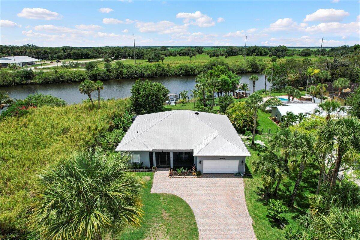 Experience the Florida dream in this fully renovated waterfront home From the moment you enter through the custom mahogany double front doors, you'll be captivated by the open floor plan ...