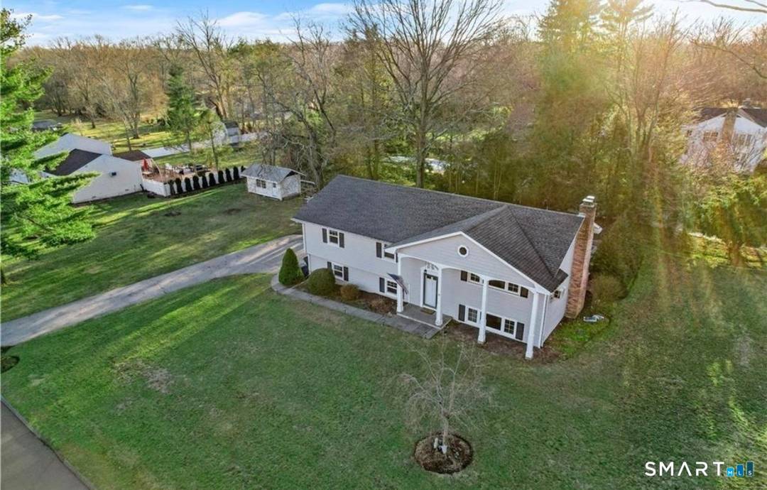 WELCOME TO 1 COTTONTAIL RD, AN INVITING SINGLE FAMILY HOME SET IN A QUIET SETTING.