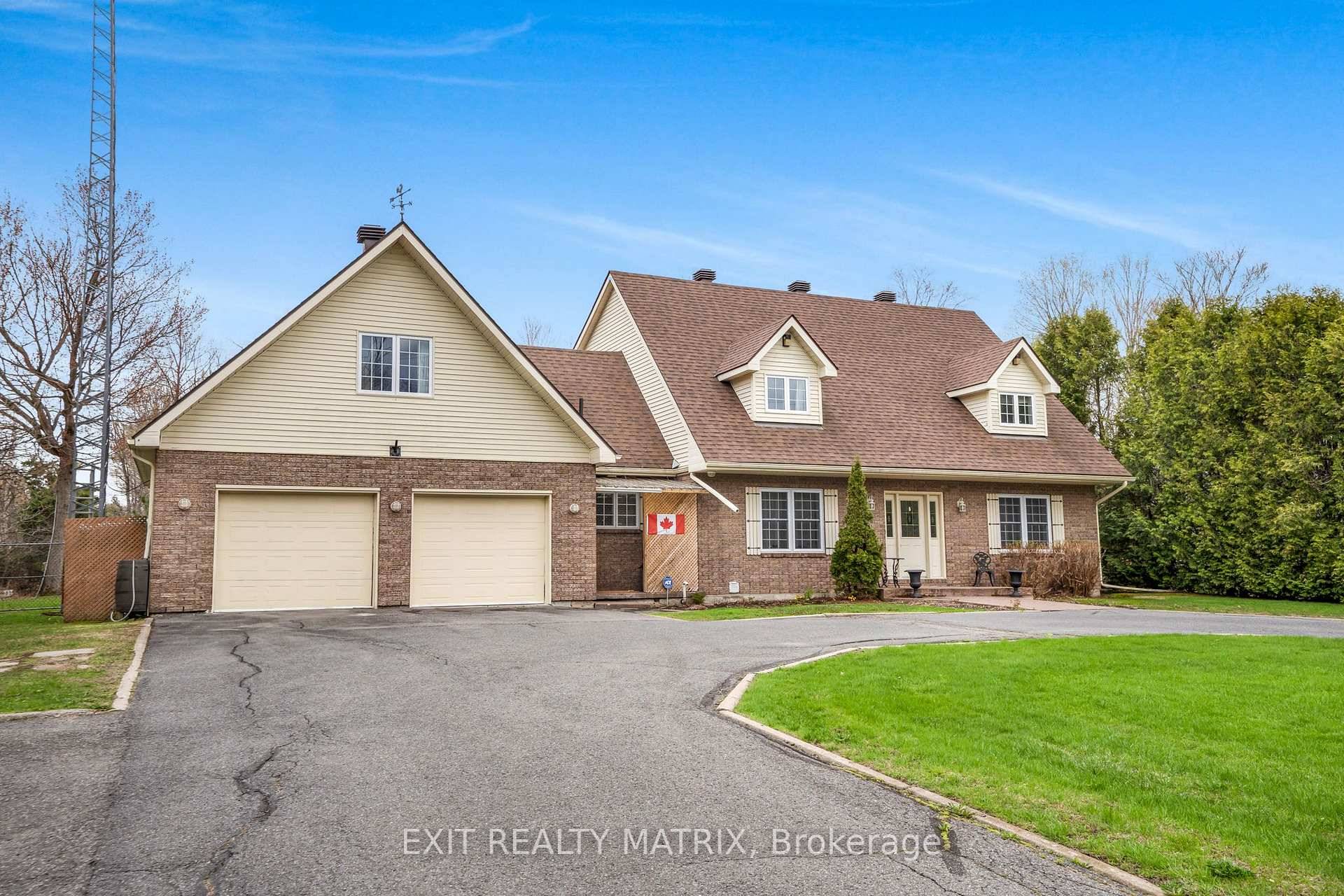 Located minutes to all amenities is this country property on a large corner lot.