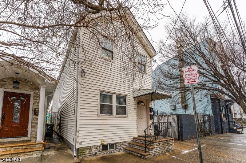 Located in the heart of Newark's vibrant Ironbound neighborhood, this two family home is equal parts opportunity and lifestyle.