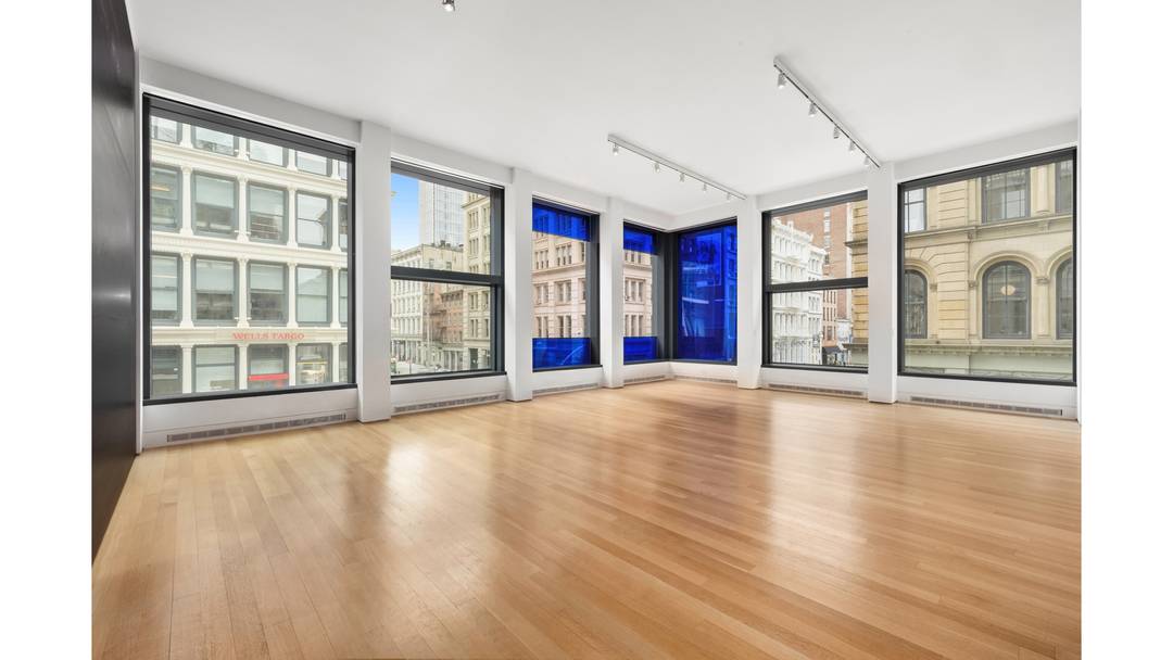 A RARE CORNER THREE BED IN JEAN NOUVEL'S ICONIC SOHO 40 MERCER DISTINCTIVE MONDRIAN INSPIRED GLASS CURTAIN FACADE WITH 12 FOOT CEILINGS BESPOKE AMENITIES 50' CARRARA MARBLE LAP POOL, SPA ...