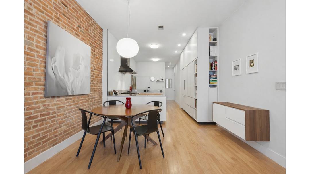 This beautifully designed garden duplex offers the scale and flexibility of a townhouse with the charm and character of classic brownstone living.