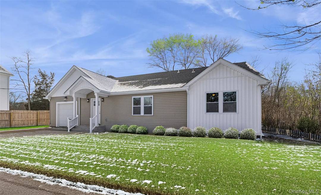 Beautifully renovated home with pond views and modern design throughout.