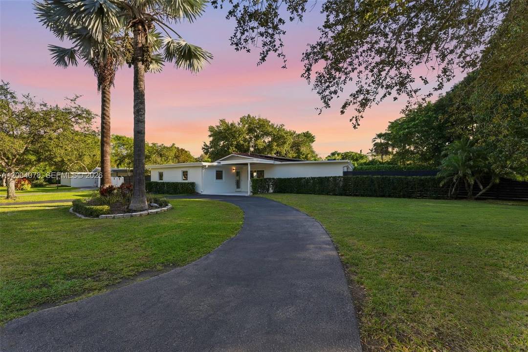 Completely remodeled and truly move in ready, this Pinecrest residence offers 4 bedrooms and 2 beautifully appointed bathrooms within 1, 856 sq ft of refined living space.