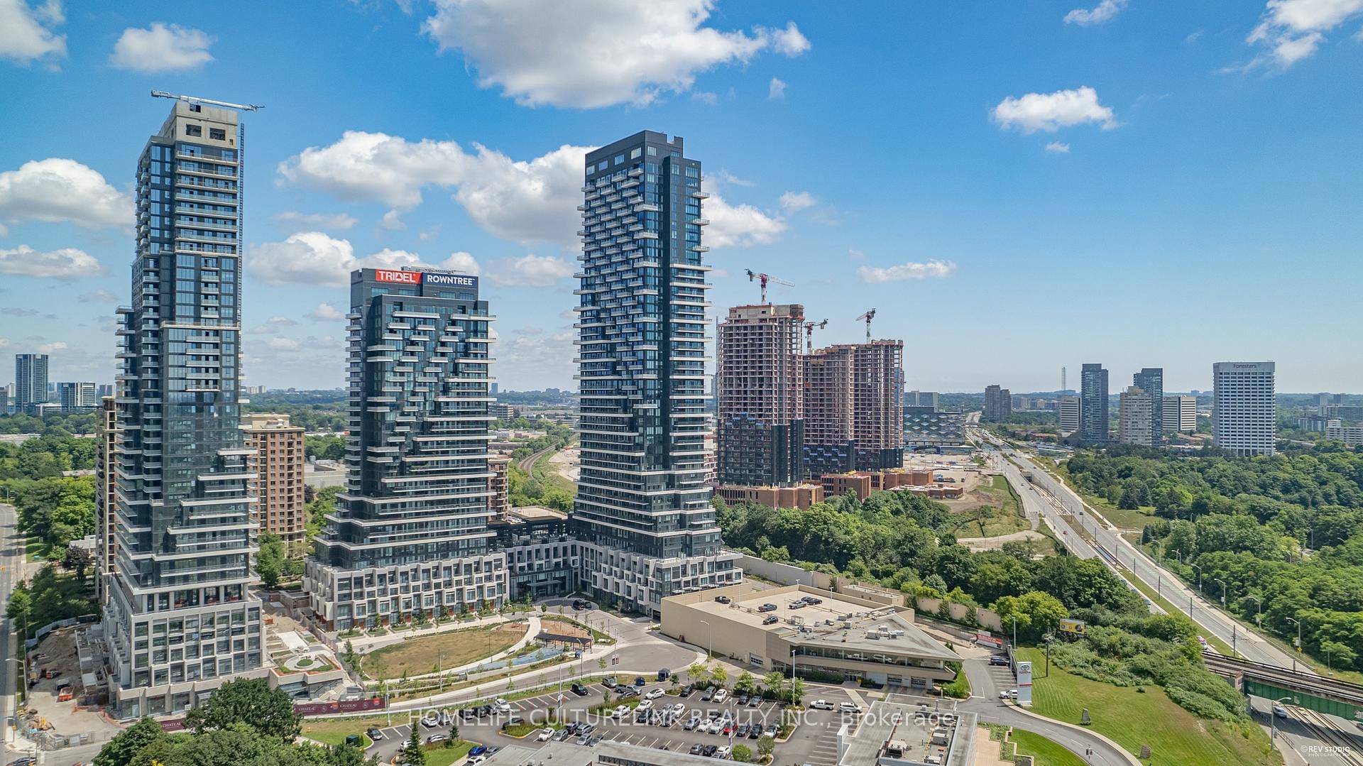 Luxurious Tridel built Auberge On The Park, beautiful corner unit with huge wrap around terrace.