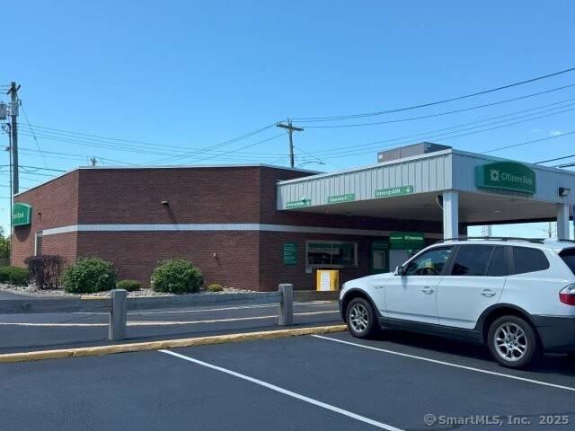 Positioned on a prominent corner lot, this freestanding commercial building is leased to Citizens Bank, a long term tenant.