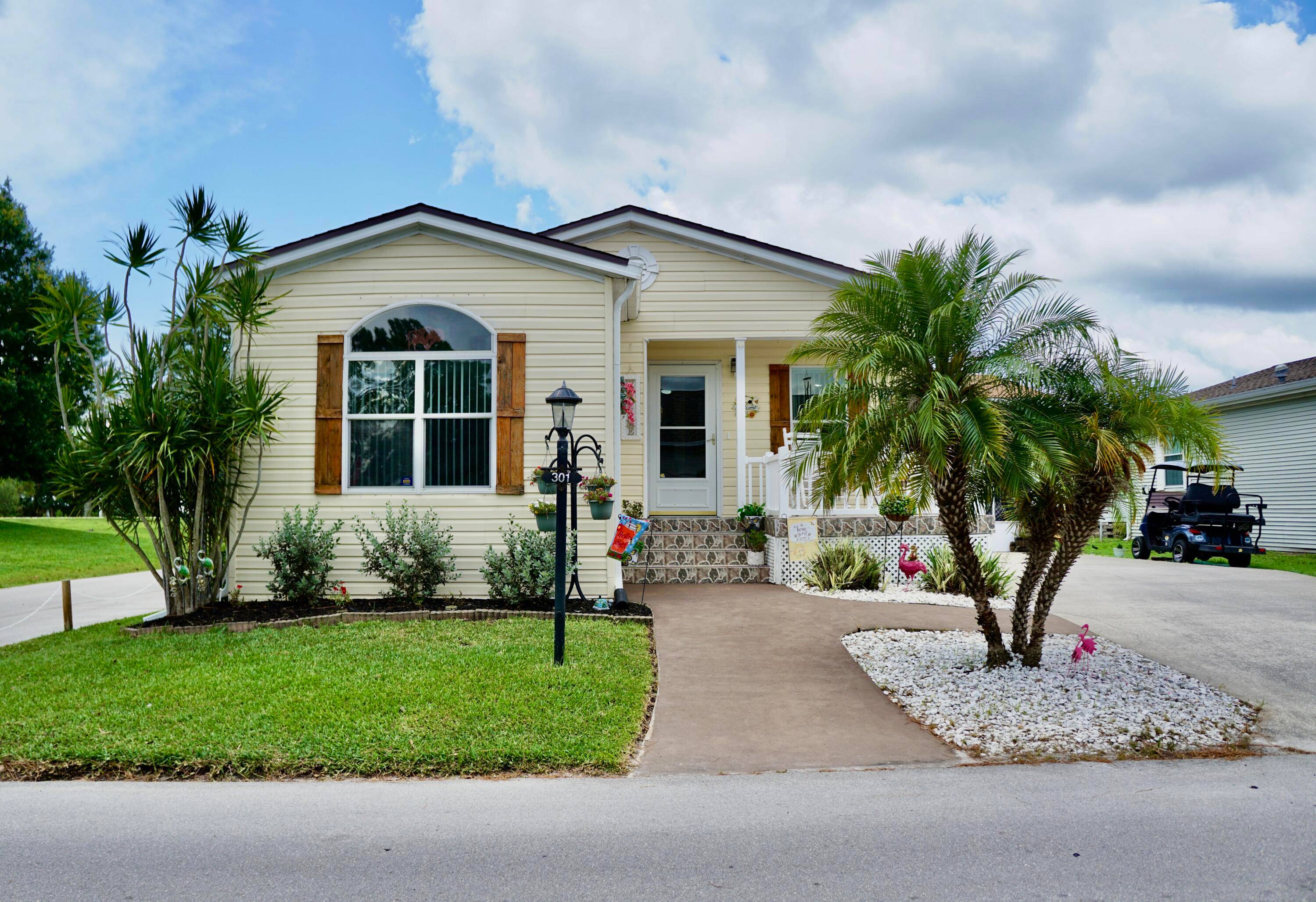 RELAX in this impeccably maintained 2003 Palm Harbor 2 bed 2 bath den home in a vibrant 55 community.