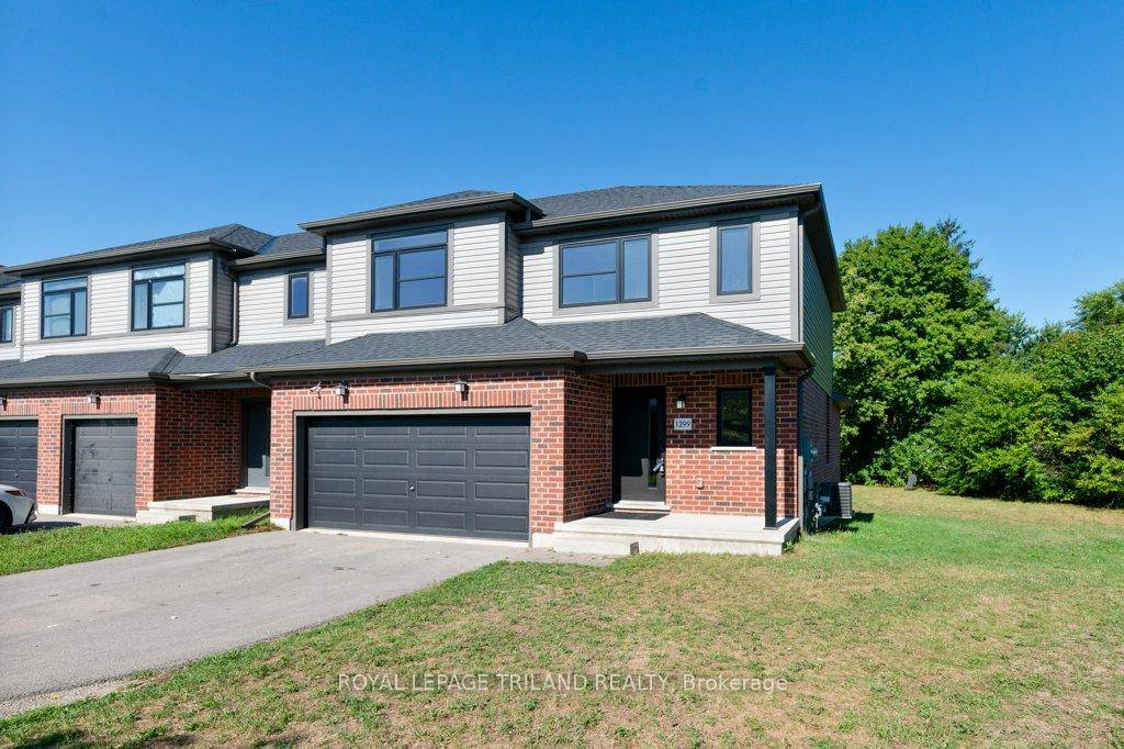 Welcome to this beautifully upgraded attached freehold 2 storey townhouse in the desirable Huron Heights neighbourhood of London, Ontario.