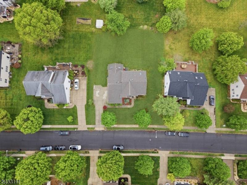 Nestled on a quiet street in the desirable Hampton Ridge community, this beautifully expanded home offers the perfect blend of elegance, comfort, and convenience.