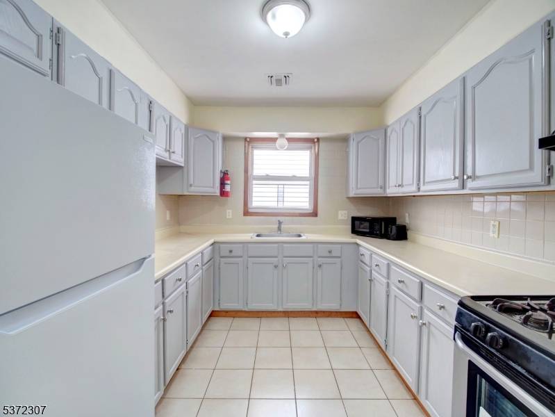 This thoughtfully maintained multi unit property offers a rare opportunity to live in one unit while generating rental income from the other or operate it as a full rental investment.