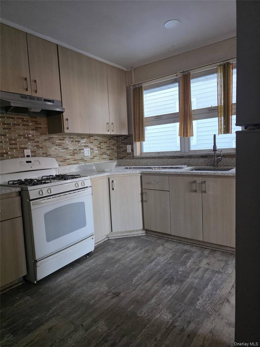 4 bedrooms, 3 bath, Combo Kitchen, Living room, Dining room, Separate Thermostat.