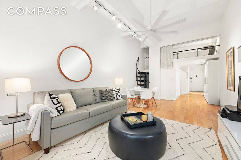 A quintessential NYC studio loft with classic details, including hardwood floors and majestic 12 foot ceilings.