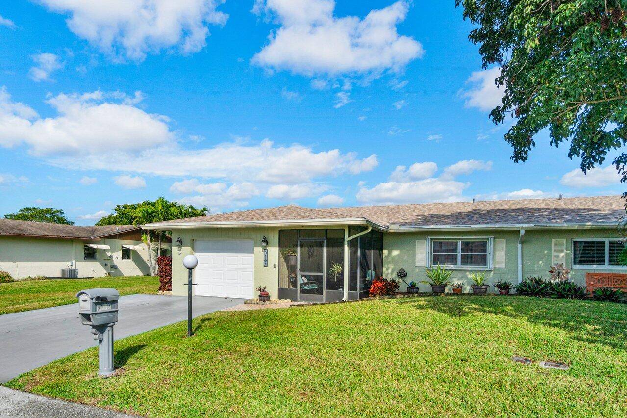 Discover your dream home at 6187 Overland Place in Delray Villas, a vibrant 55 community in Delray Beach, FL !