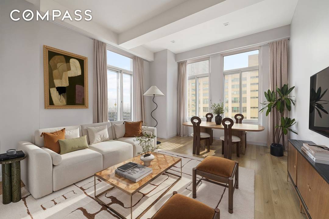 Welcome to Residence 8D at The Beacon Tower a bright, beautifully renovated two bedroom, two bathroom home in the heart of DUMBO.