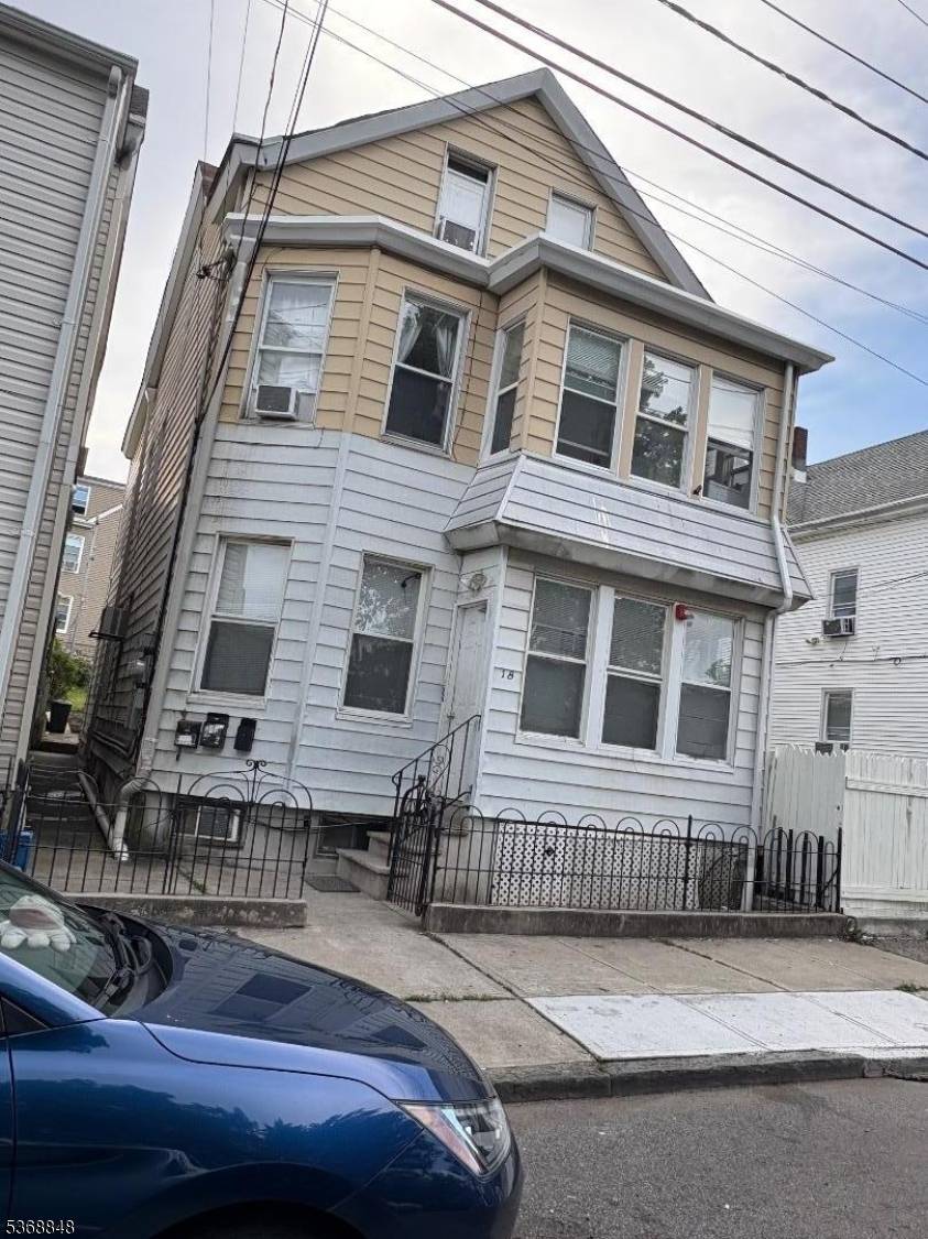 3 FAMILY HOME IN NEED OF TLC BUT IN DESIRABLE SOUTH PATERSON SECTION.