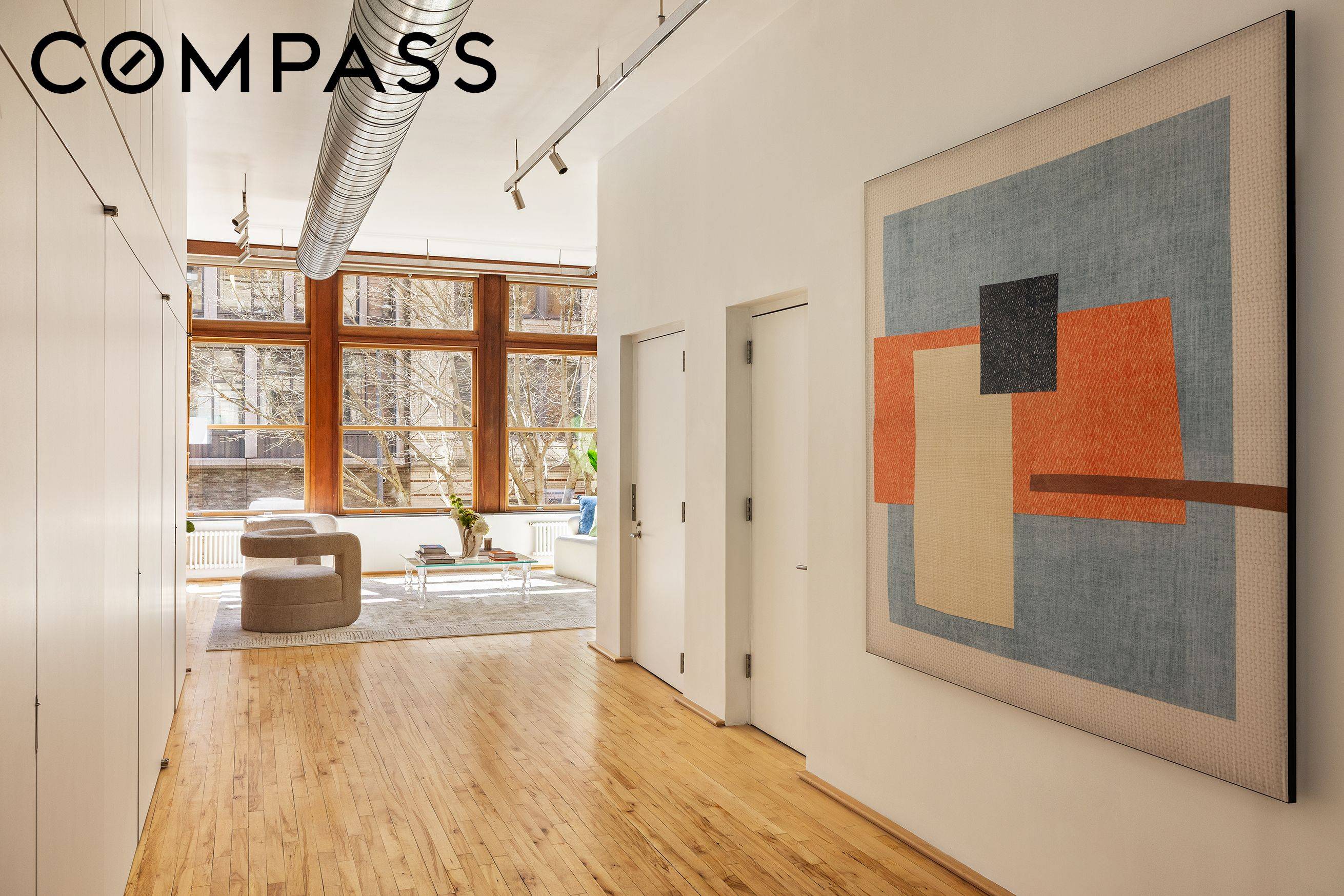 Step out of your key locked elevator directly into a full floor NoHo loft where classic Downtown Manhattan architecture meets a thoughtful 2011 modernist gallery style renovation by ICON Architects.