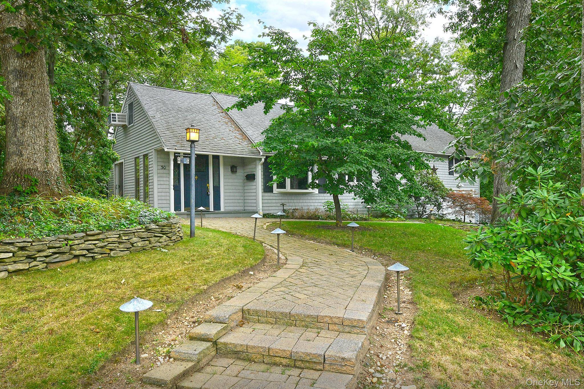 Charming 4 Bedroom, 1. 5 Bath Rollingwood Split tucked up on almost a half acre that offers peace and privacy.