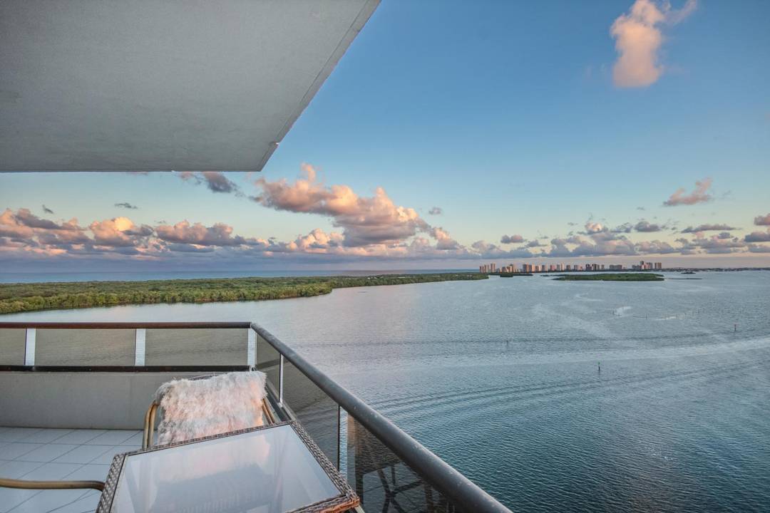 Step into luxury living in this beautifully renovated 14th floor residence, showcasing unobstructed southeast waterfront views from every main room.