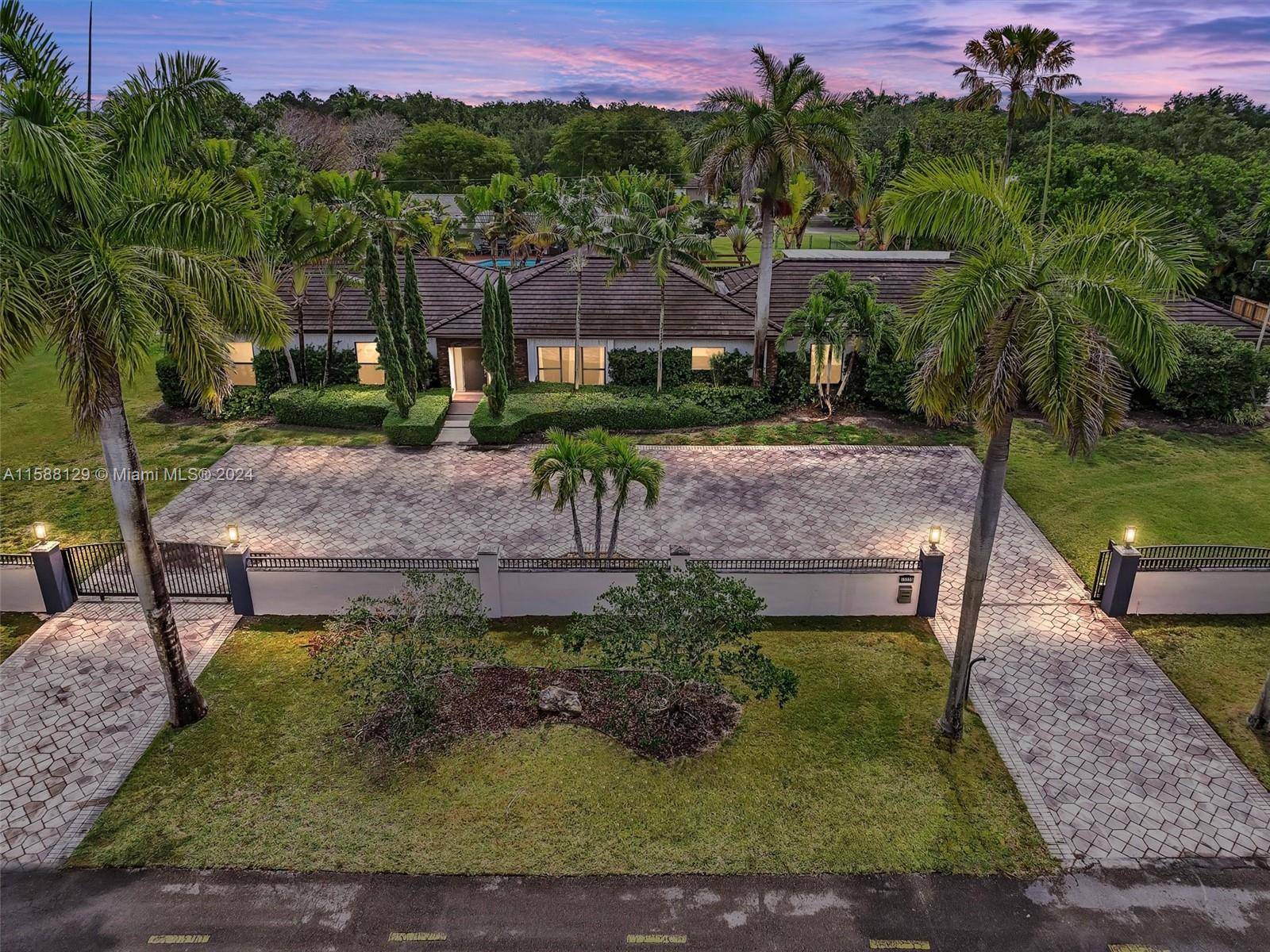 Welcome to 15555 Old Cutler Rd, a stunning home that blends comfort, luxury, and entertainment.