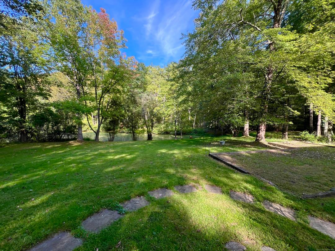 Come see this private North Stamford home beautifully situated on picturesque waterfront property and featuring open, airy rooms !