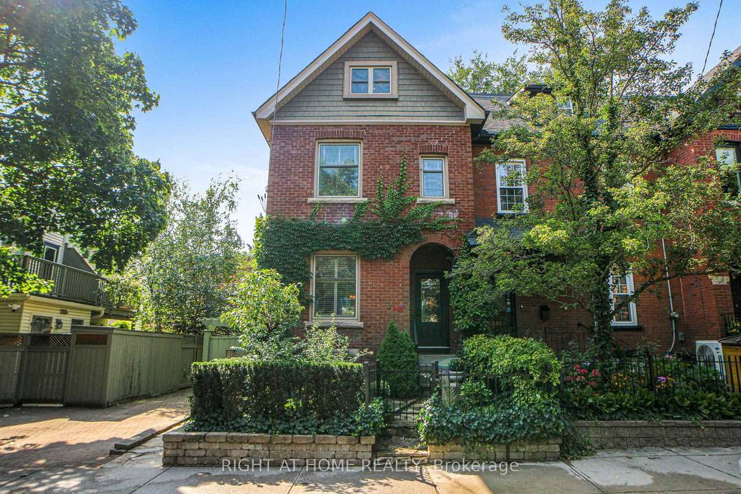 Nestled in the heart of Cabbagetown, this charming home boasts a perennial, three season flowering garden and seamlessly blends classic period features with modern conveniences.