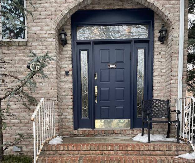 Spacious 5 bedroom colonial featuring a large entry foyer, open concept formal living room, formal dining room.