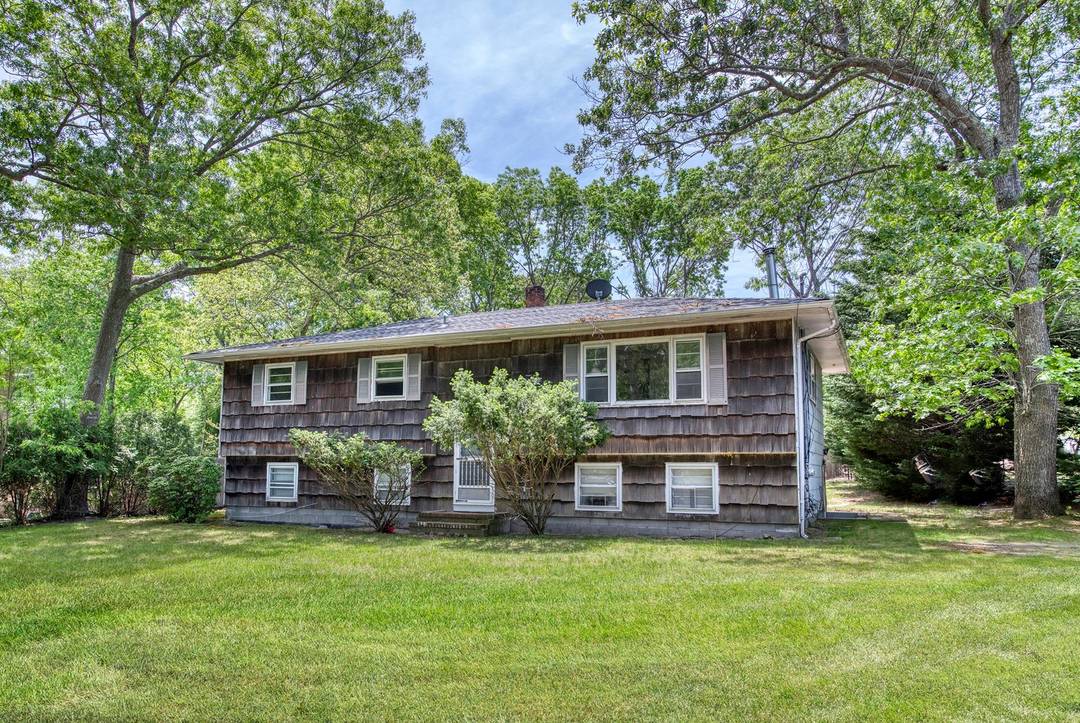 This is your investment opportunity to have a home in Sag Harbor Village only 1 2 mile from Main Street with 2 bedrooms on the top floor and additional low ...