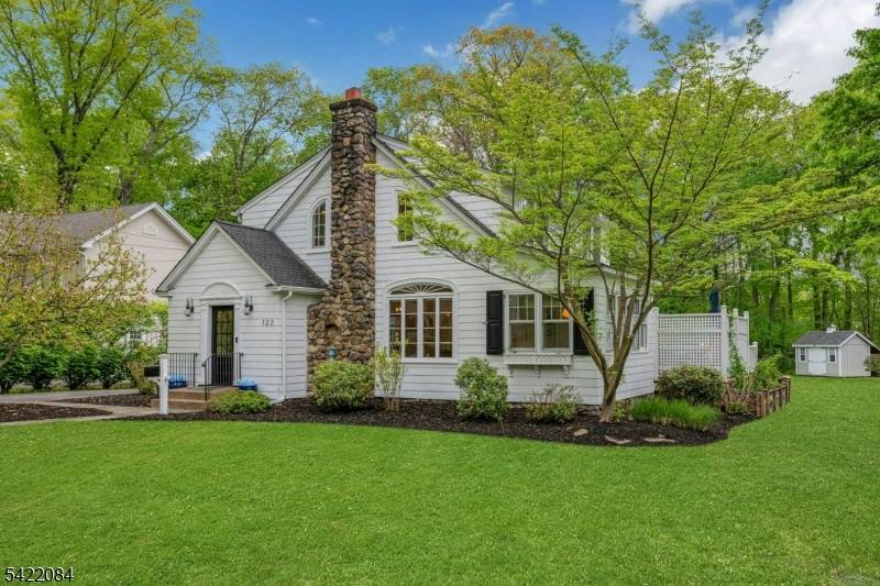 There aren't enough synonyms to capture all the charm of this enchanting 1930 Tudor !