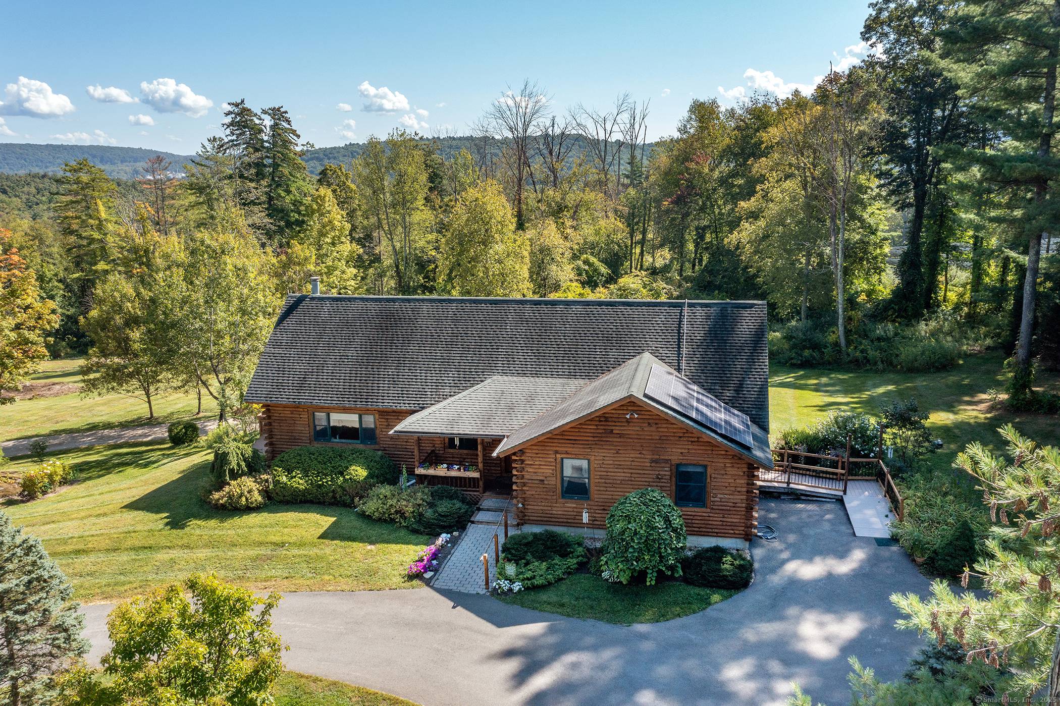 This stunning 2, 299 sq ft log cabin inspired Beaver Mountain home on 4.