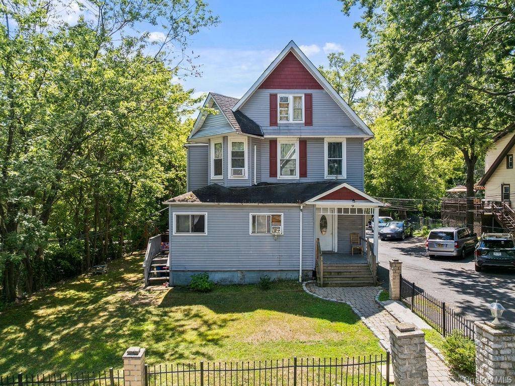 Welcome to 53 Brookside Avenue, a beautifully maintained Victorian style triplex in the heart of Nyack.