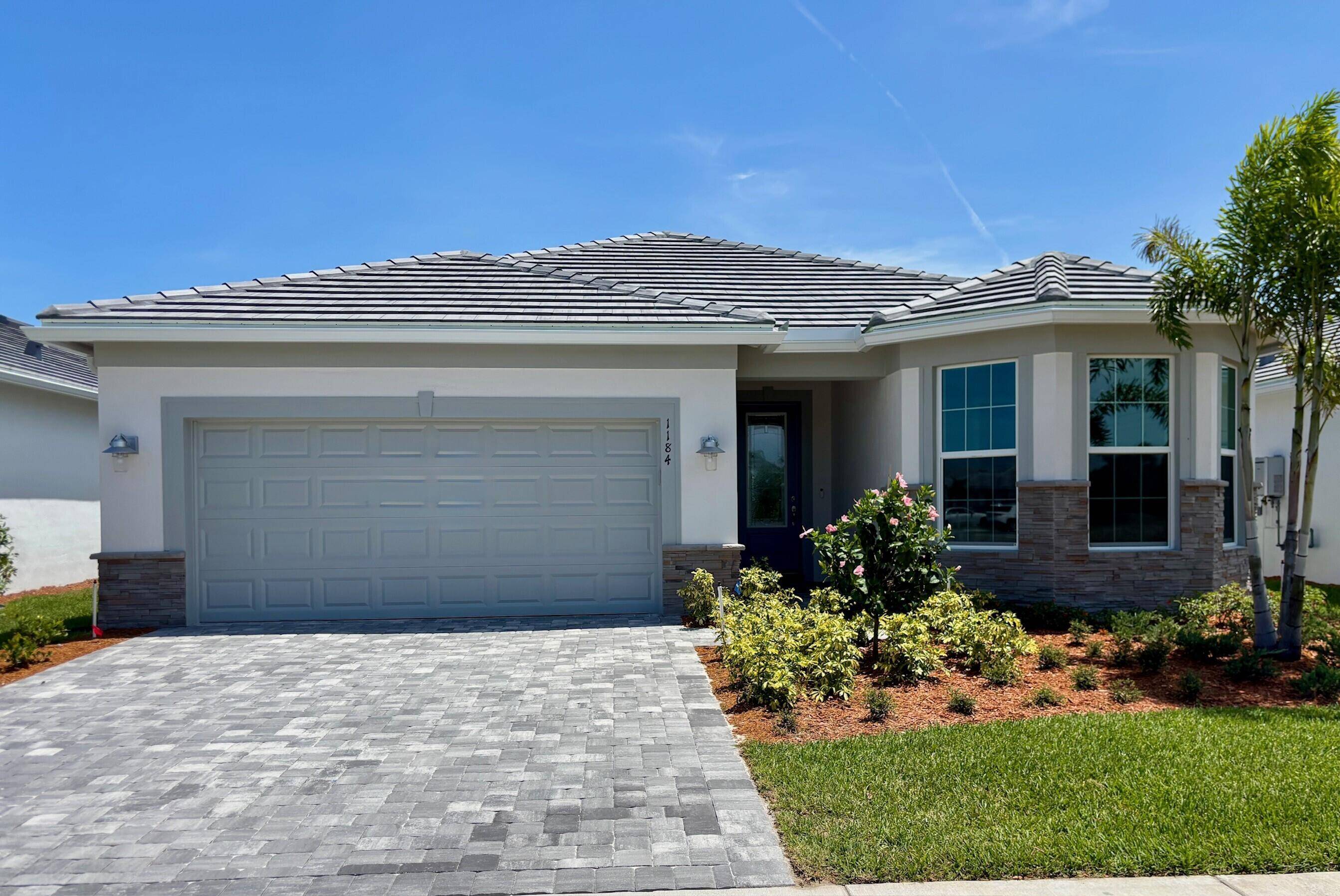 NEW CONSTRUCTION Elegant Finishes from Front to back awaits you in this Prestige plan at Costa Pointe.