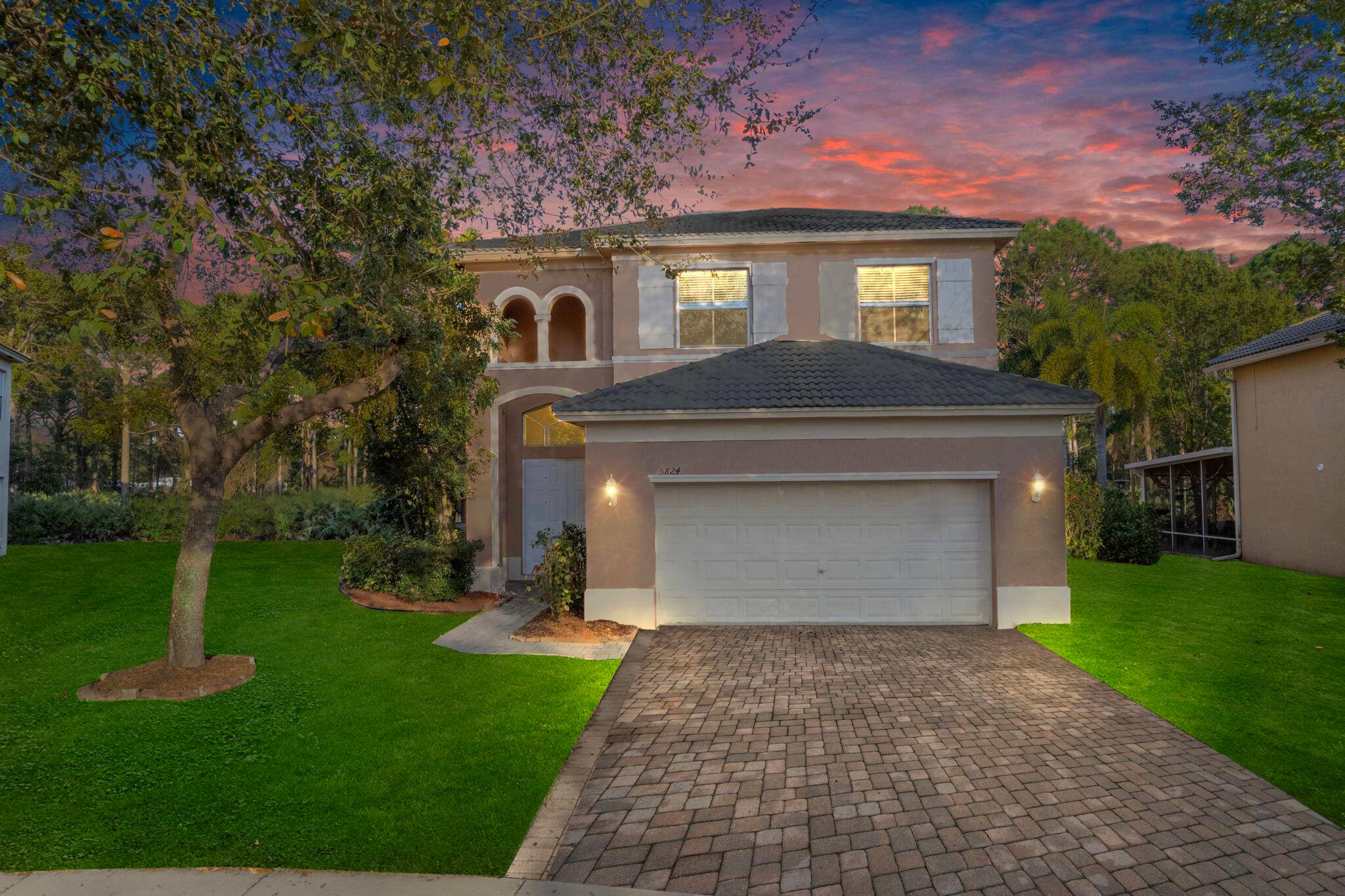 Welcome to this stunning 2 story CBS home in the Portofino Shores community !