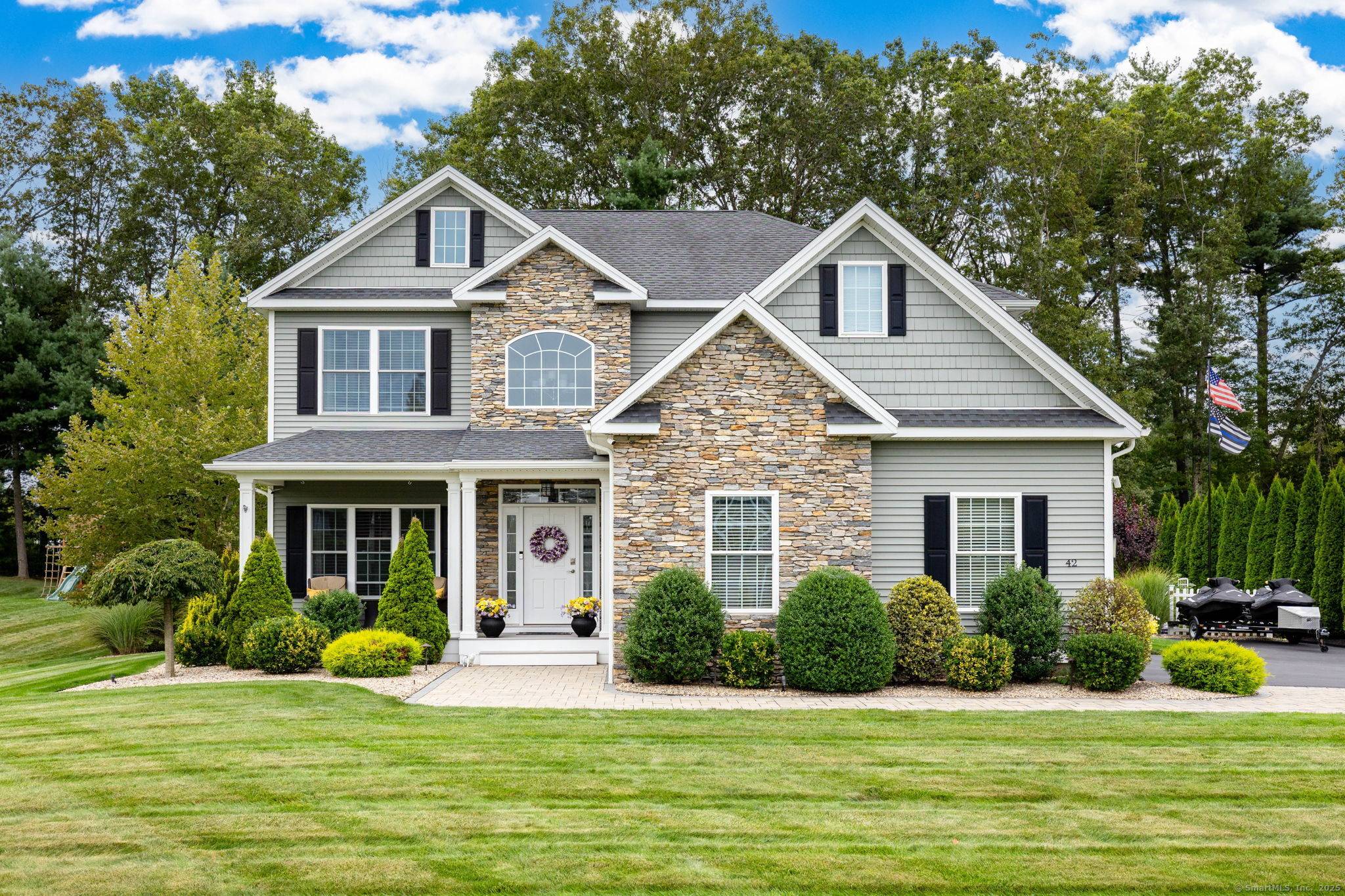 Stunning 2016 built Colonial offering timeless style, modern amenities, and an idyllic setting in one of the area's most desirable neighborhoods !