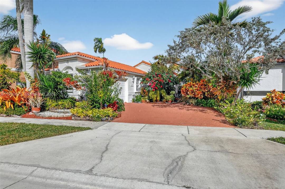Beautiful pool home located in a friendly, gated community in Boca Raton.