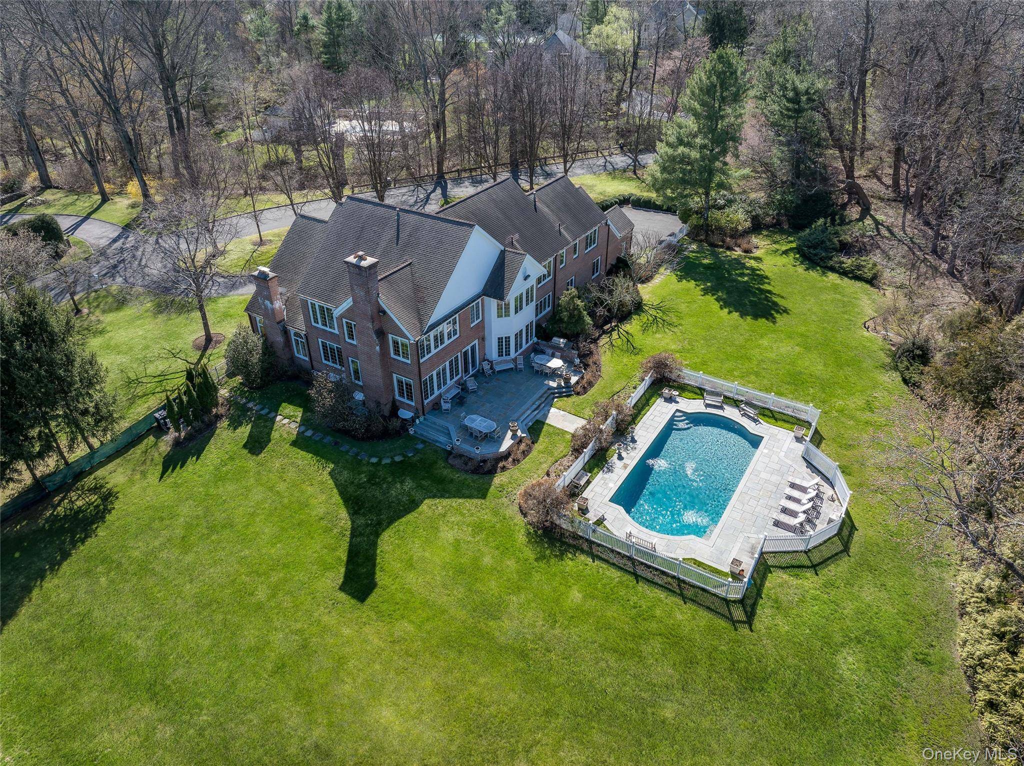 Magnificent 2 acre estate on one of Purchase s most coveted streets !