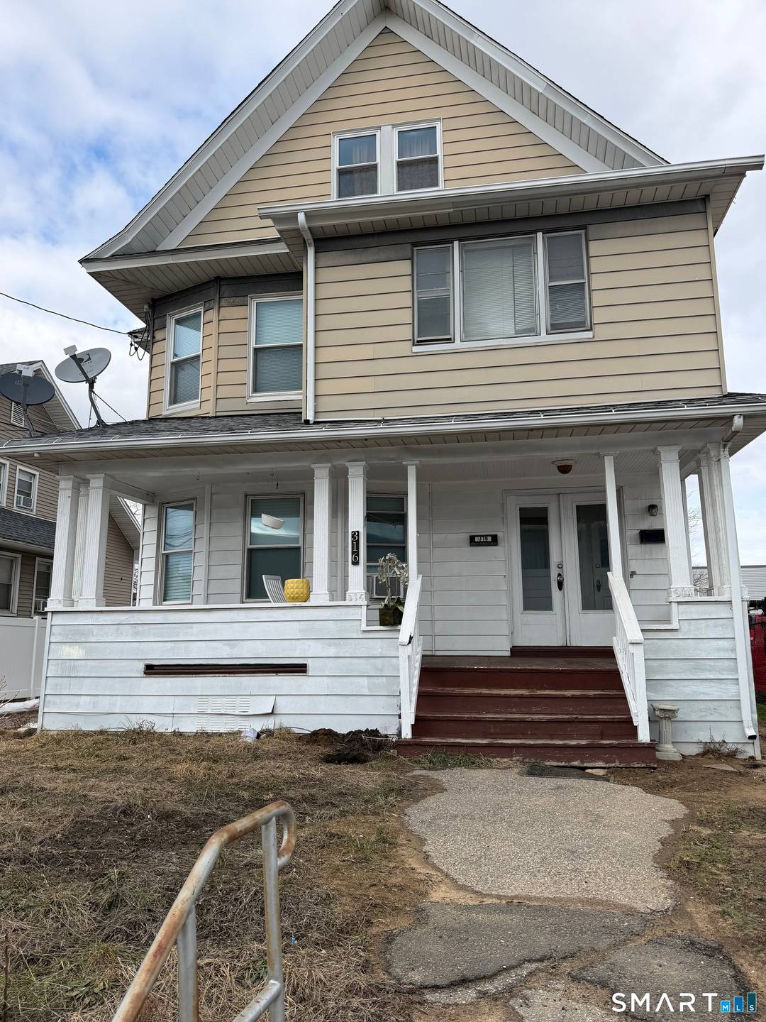 Spacious two family home offering 7 total bedrooms and endless potential !