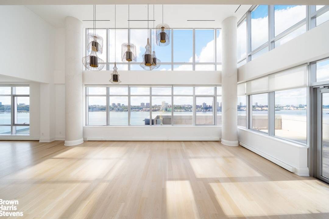 Seamlessly blending over 5, 700 square feet of interior living space and a massive 4, 500 square foot terrace with private pool, this extraordinary duplex corner residence at One Riverside ...
